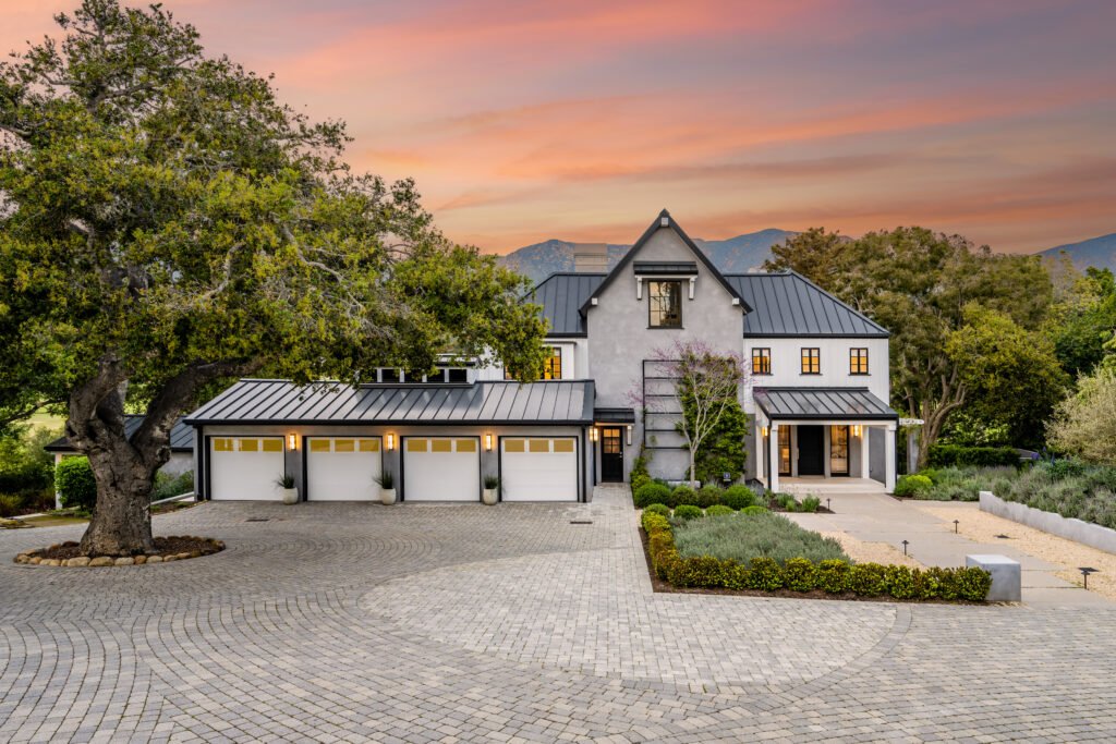 Modern farmhouse-style exterior by Battaglia West, showcasing high-quality craftsmanship, modern design elements, and exceptional curb appeal.