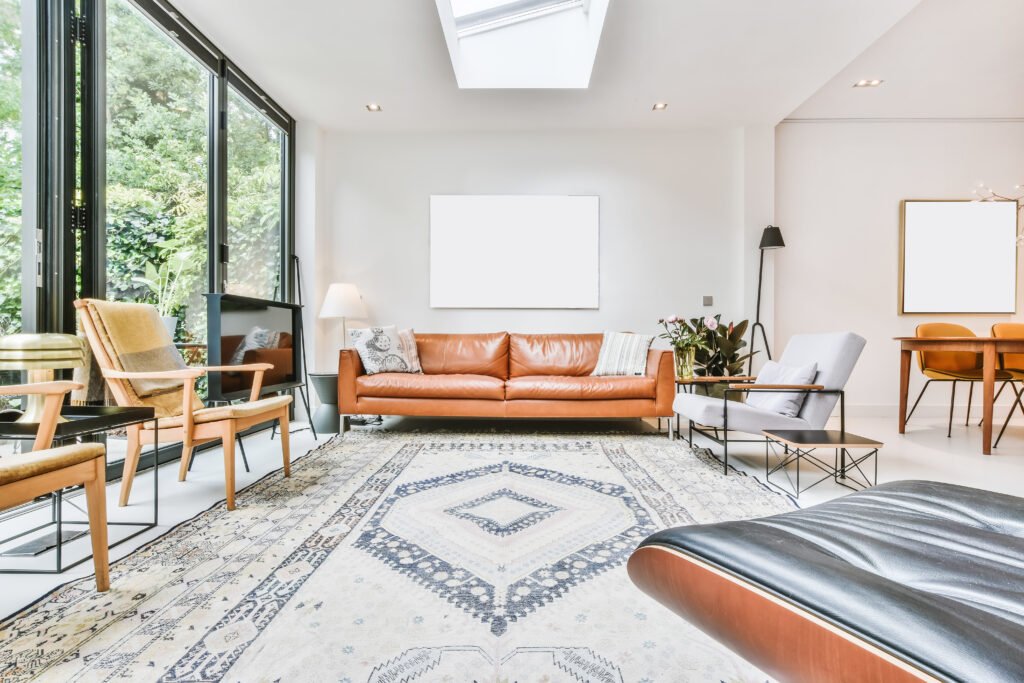 Spacious living room in a Battaglia West custom home, highlighting exquisite finishes, natural light, and personalized interior design.